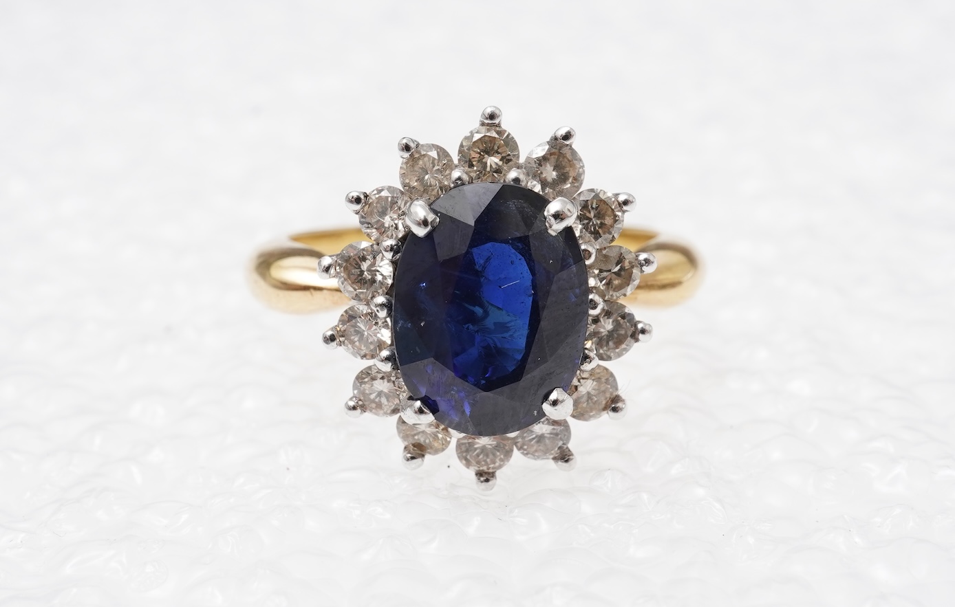 A sapphire and diamond cluster ring